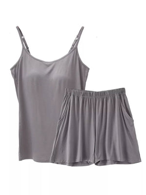 Gray cami and shorts pajama set with adjustable straps and pockets.