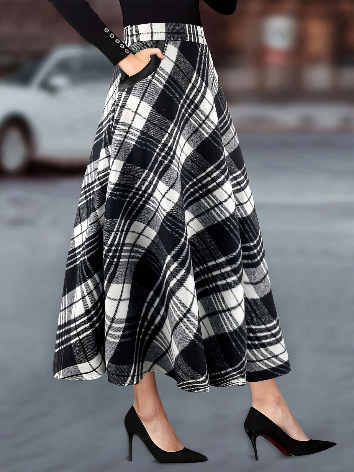 midi skirt in black featuring pocketed and A-line fit