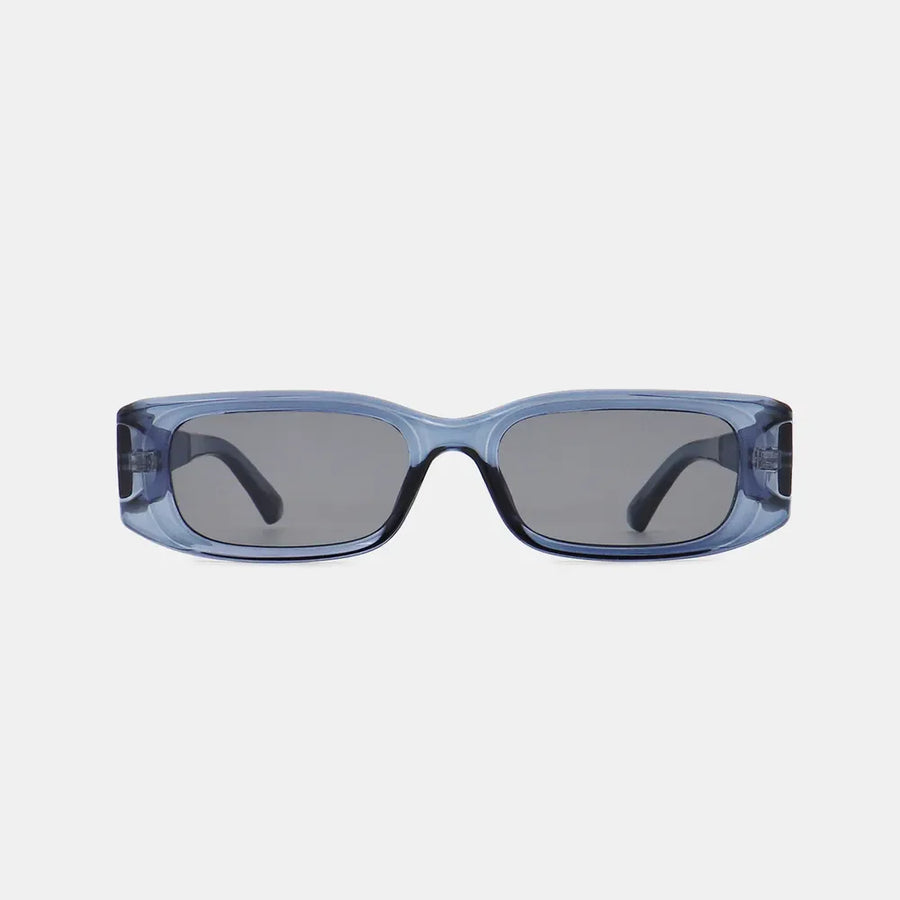 Chunky rectangular sunglasses in dusty blue with dark lenses and thick frames.