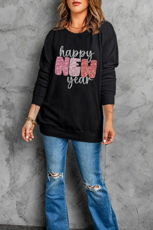 Black sweatshirt with glittered "Happy New Year" graphic, crew neck, long sleeves.