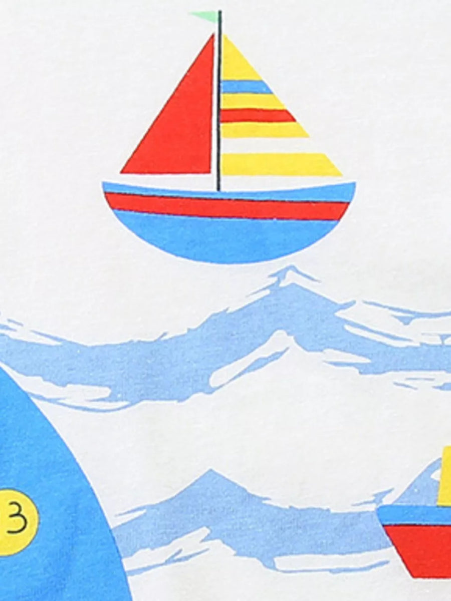 Toddler cotton tee with nautical sailboat print and wave pattern.