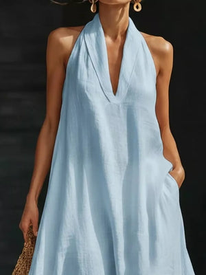 Light blue halter neck maxi dress with pockets, V-neck, sleeveless, 100% polyester.