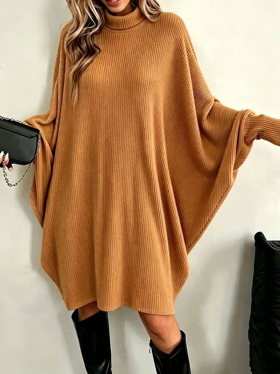 Black sweater dress featuring oversized and ribbed knit
