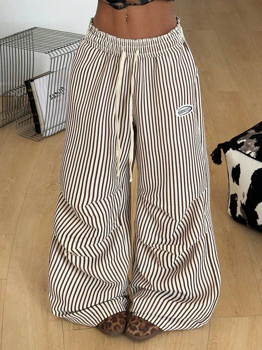 100% polyester Care instructions: Machine wash cold cargo pants in Khaki with wide-leg silhouette