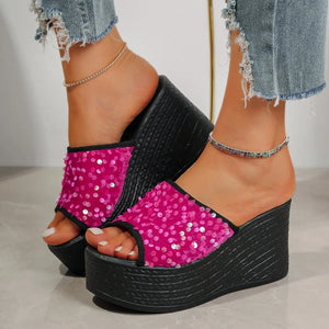 Hot Pink sequin embellished platform wedge slides with black soles and trim.