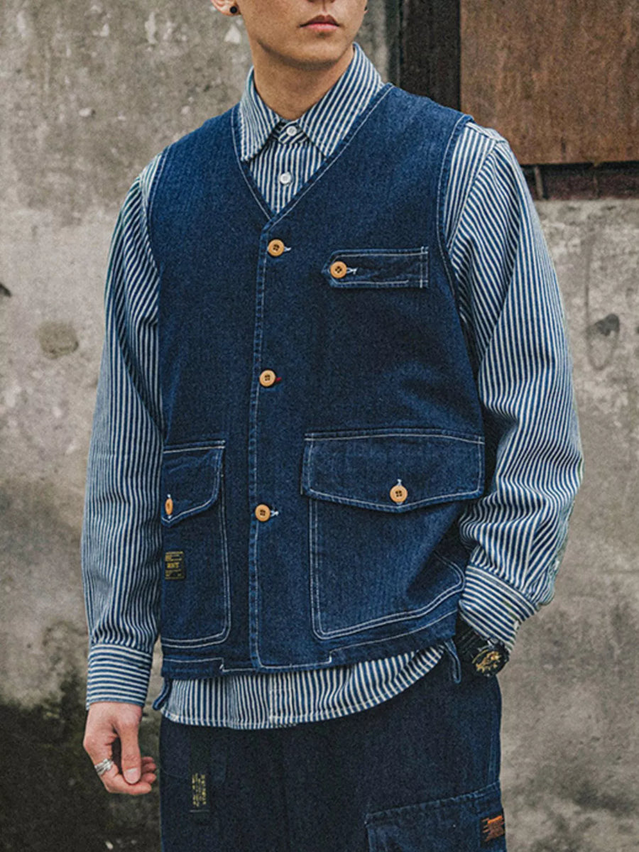Plus-size navy denim vest with V-neck, button-up front, and four pockets.
