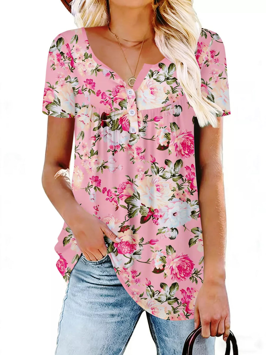 Pink floral ruched v-neck t-shirt with button detail and short sleeves.