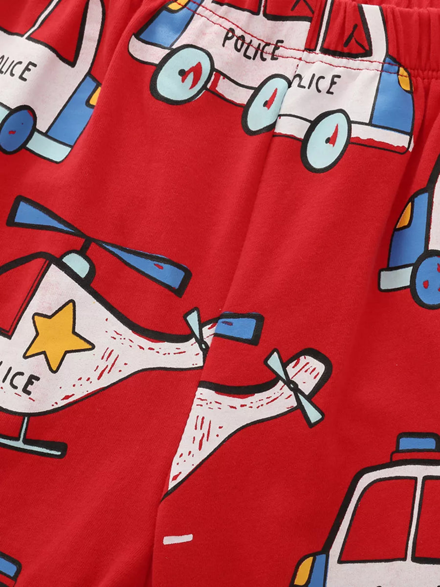 Red cotton toddler set with playful police car and helicopter graphics.