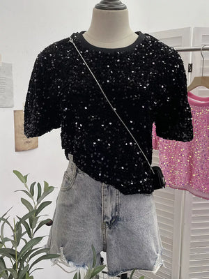 Black iridescent sequin embellished t-shirt with crew neck and short sleeves.