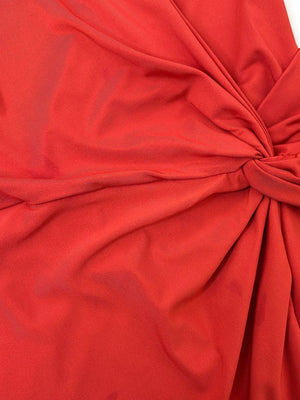 Red jersey wrap dress with knot detail