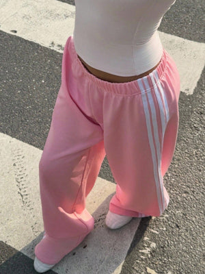 track pants in Black with striped and high-waisted