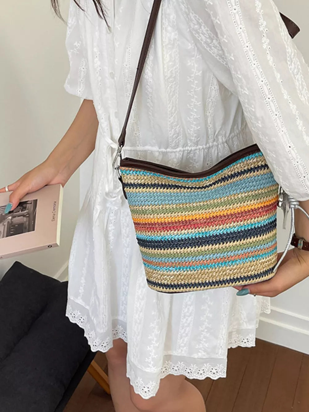 crossbody bag in light blue with striped and adjustable strap