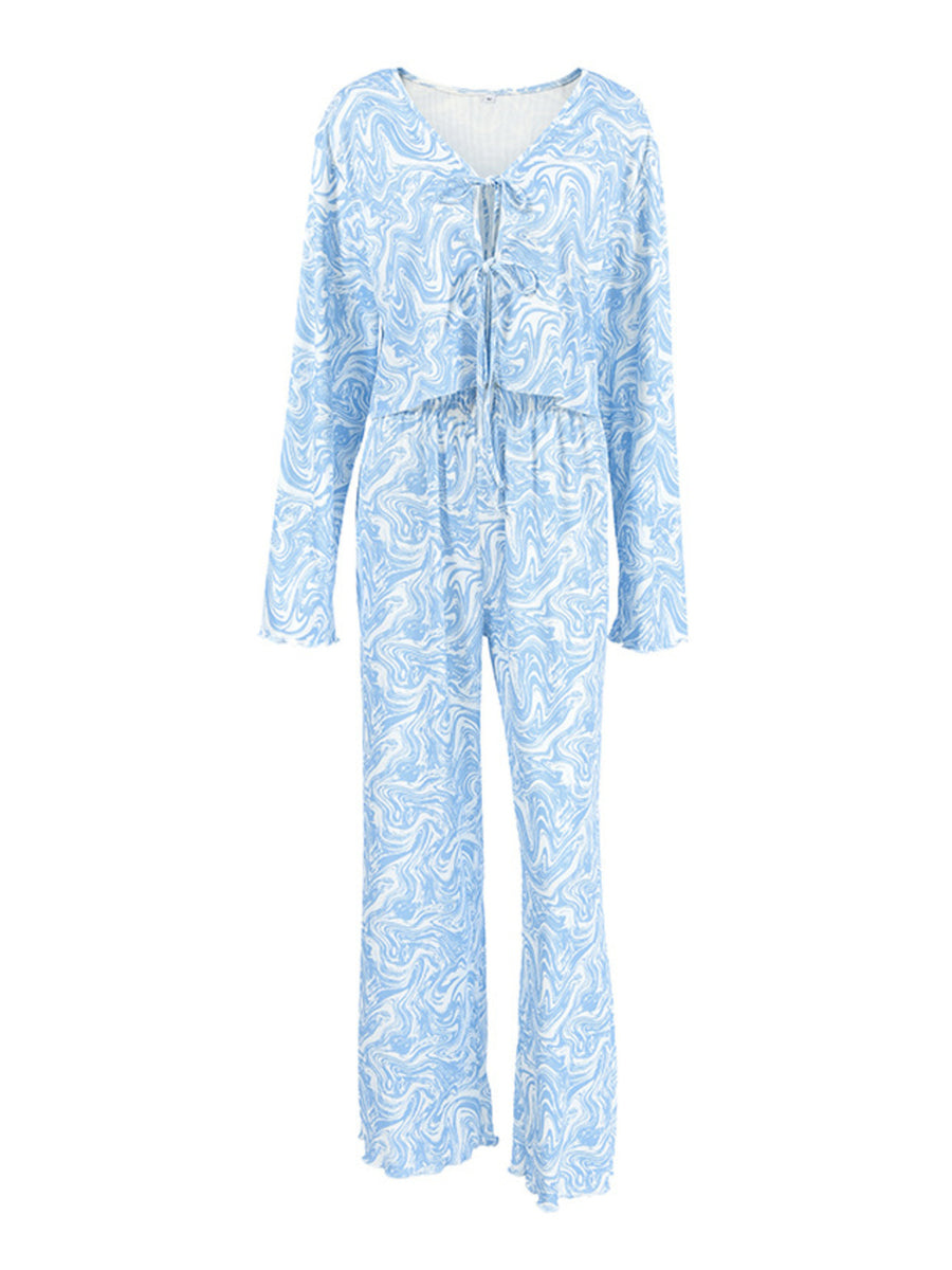 Blue and white marble print lace-up lounge set with drawstring pants and long sleeves.