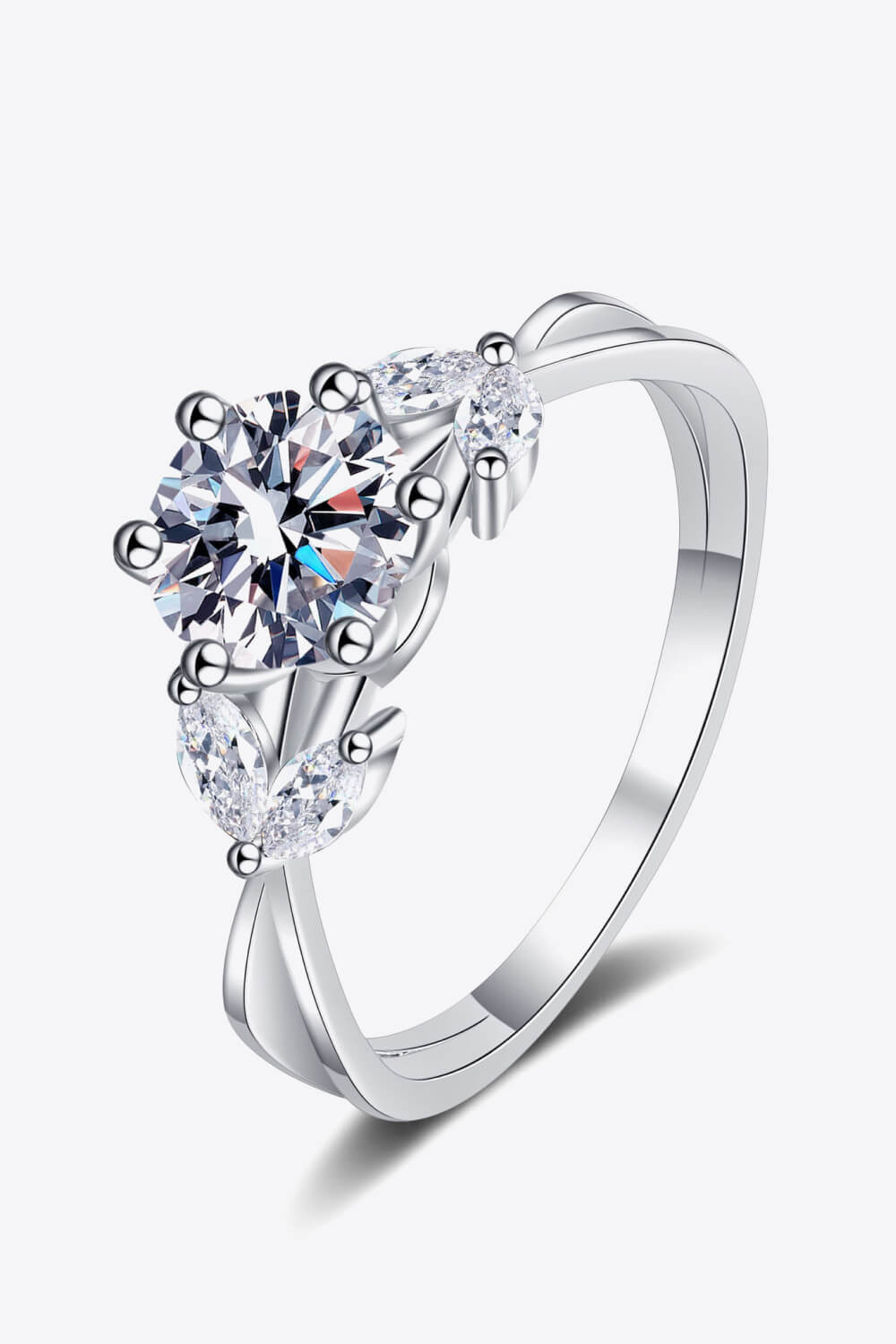 Silver moissanite ring with a round center stone and marquise accent stones.