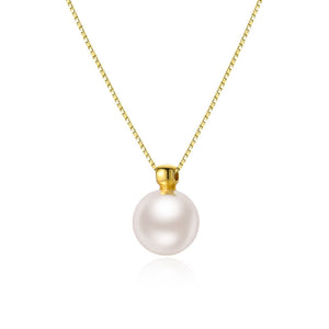 Gold chain necklace with a single white pearl pendant.