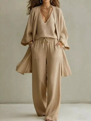 Beige linen 3-piece set with V-neck cami, wide-leg pants, and open-front duster cardigan.