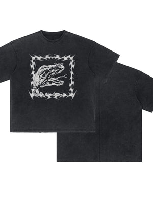 Black distressed graphic tee with dinosaur motif and flame border.