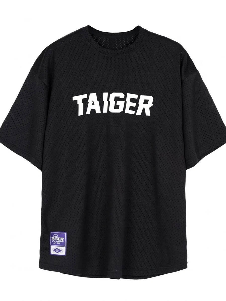 Black mesh oversized t-shirt with white TAIGER graphic and tag detail.