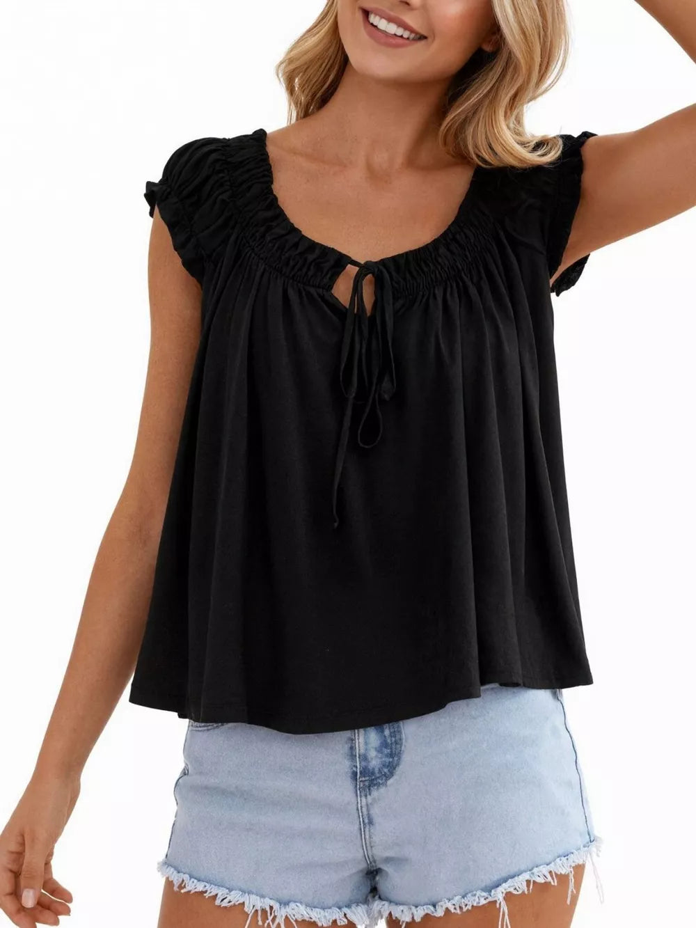 Black tie-front gathered blouse with short ruffled sleeves and a scoop neckline.