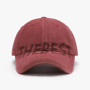 Textured denim baseball cap in Scarlet with "THEDEST" graphic.