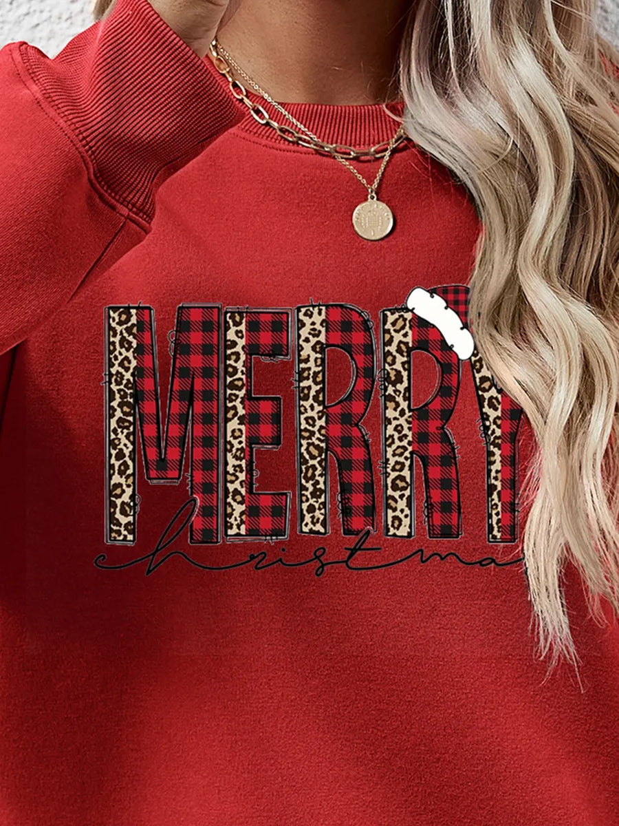 Red graphic sweatshirt with "Merry Christmas" text in buffalo plaid and leopard print.
