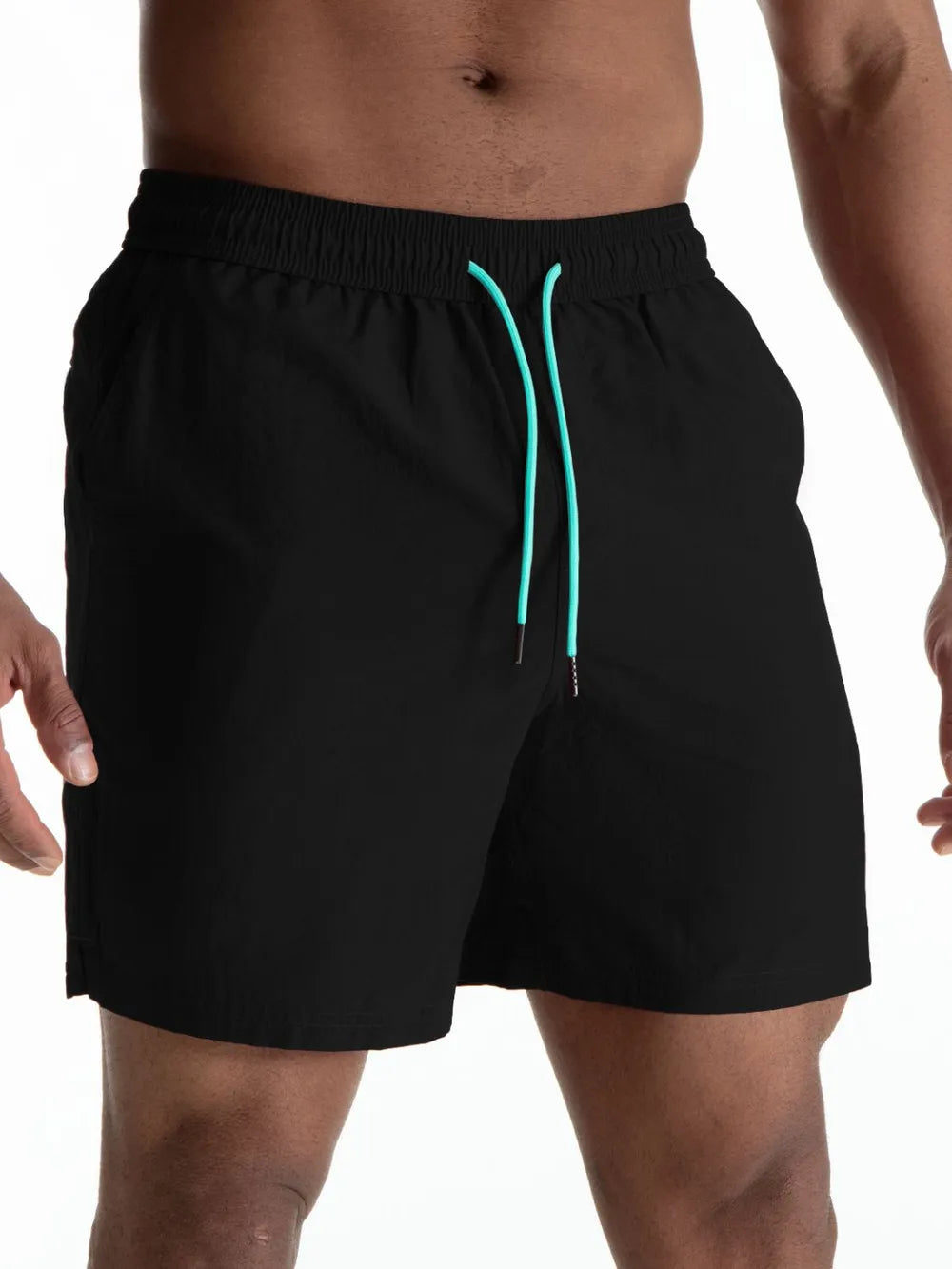 Black boardshorts with contrast teal drawcords and elastic waistband.