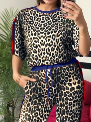 Leopard print loungewear set with blue trim and red stripe detail.