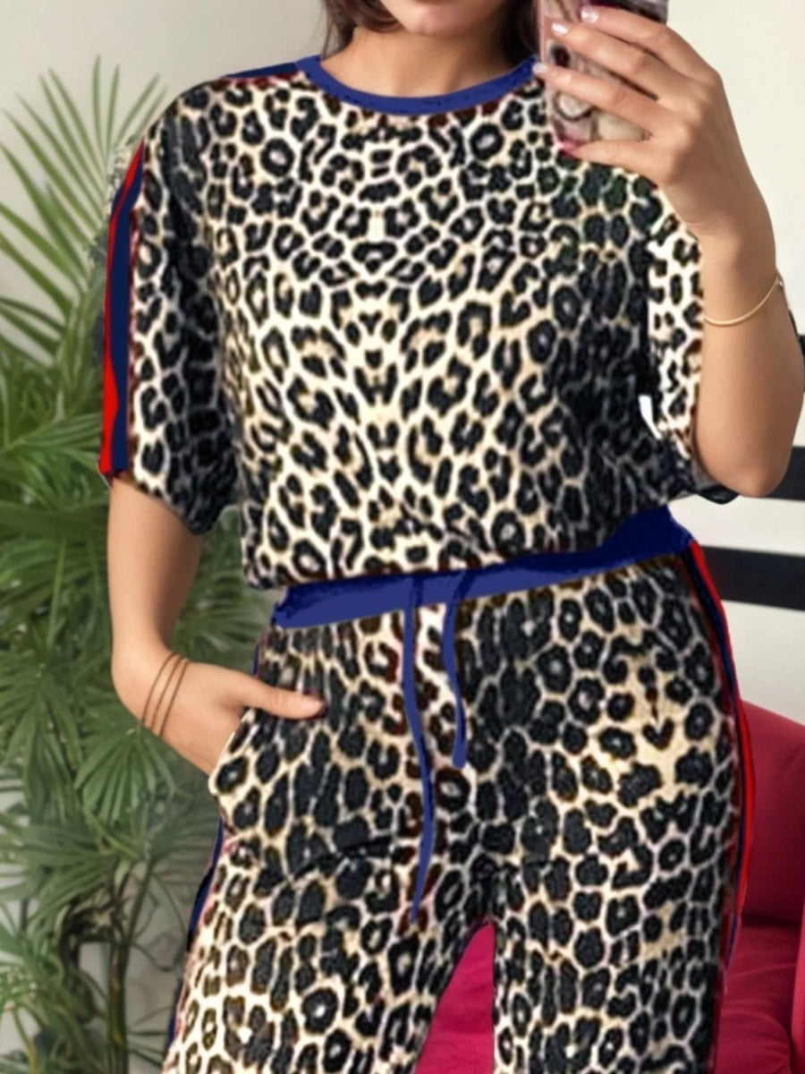 Leopard print loungewear set with blue trim and red stripe detail.