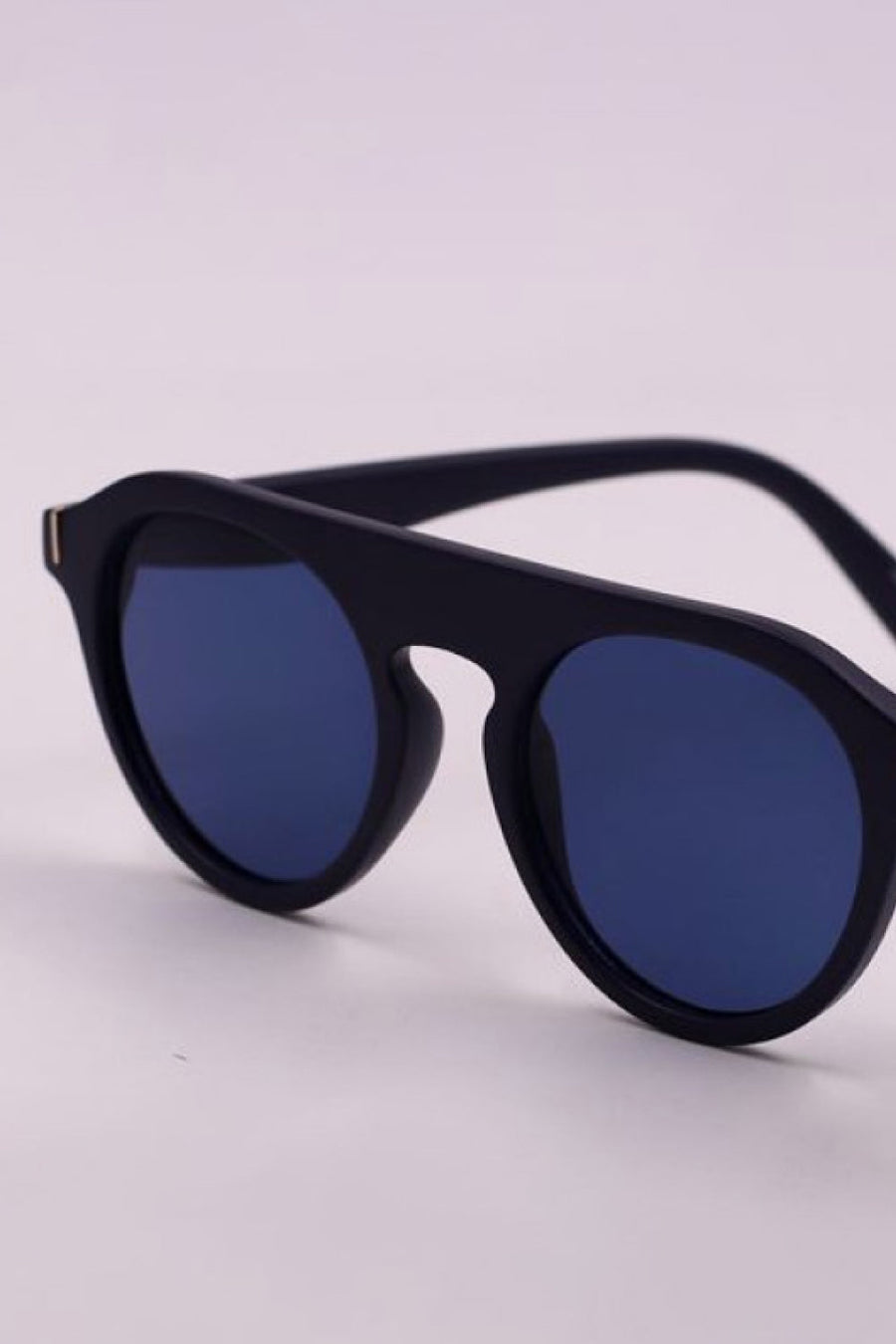 Round frame sunglasses with dark blue lenses and black frames.