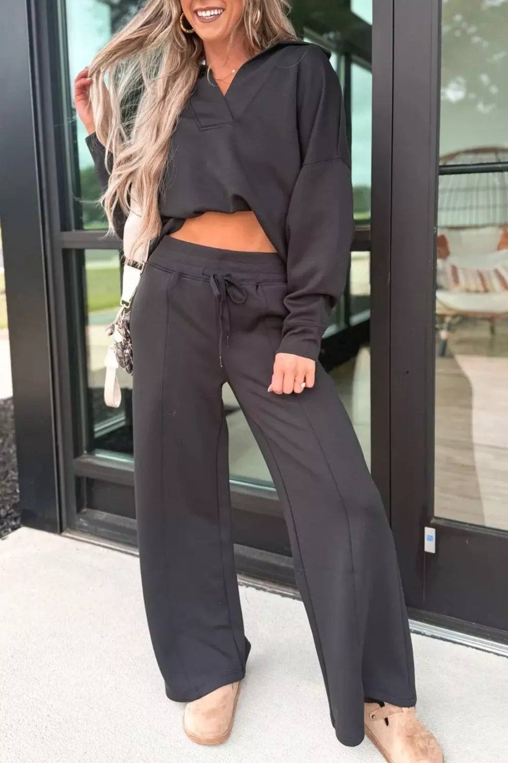 Black collared v-neck sweatshirt and wide-leg drawstring pants set