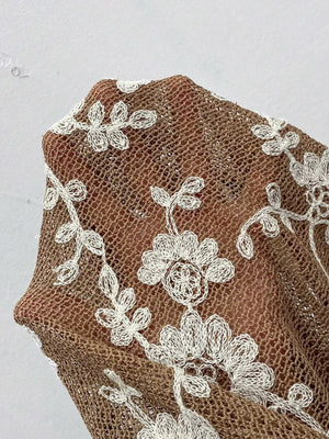 Sheer coffee brown blouse with white floral embroidery detail