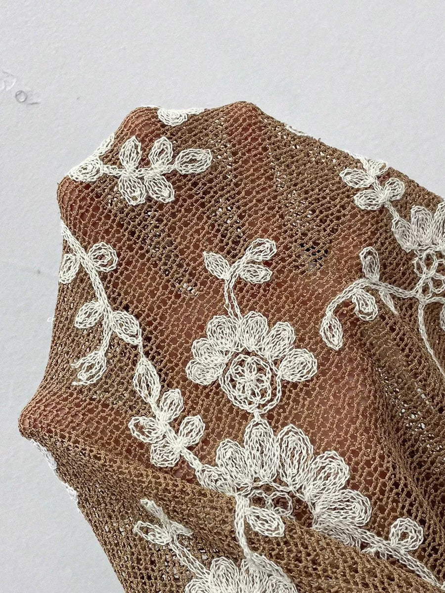 Sheer coffee brown blouse with white floral embroidery detail
