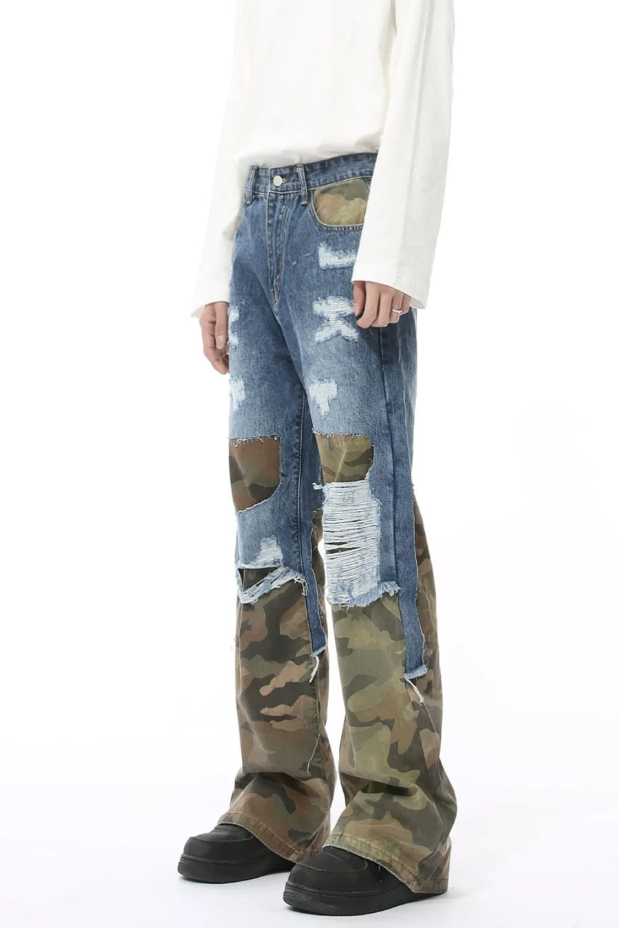Camouflage panel distressed wide-leg jeans in blue denim with ripped details.