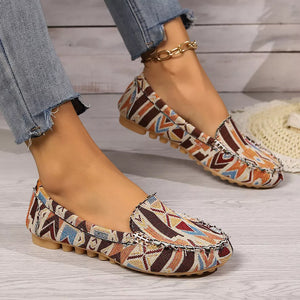 orange shoes featuring round toe and geometric