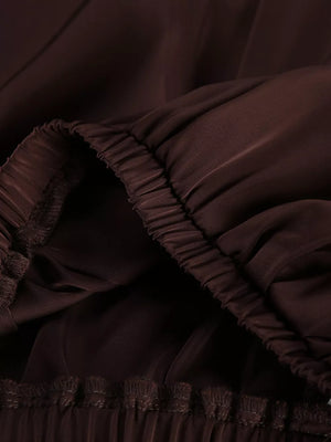two-piece set in chocolate brown with ruffled and full-length
