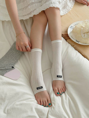 Breathable Knit Stirrup Socks in Black with stirrup
