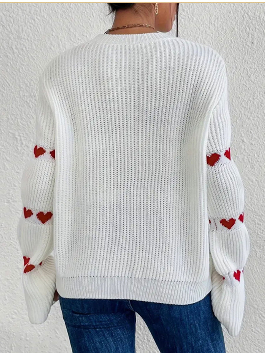 100% polyester Care instructions: Machine wash cold pullover sweater in Red Apricot with relaxed silhouette