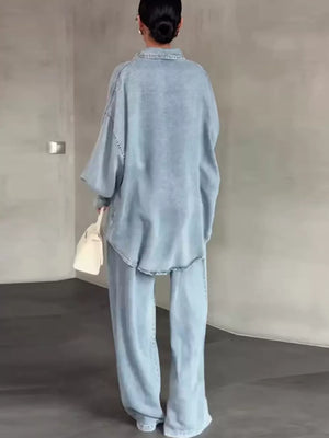 light blue shirt and pants set with tunic-length top, full-length pants and button-front