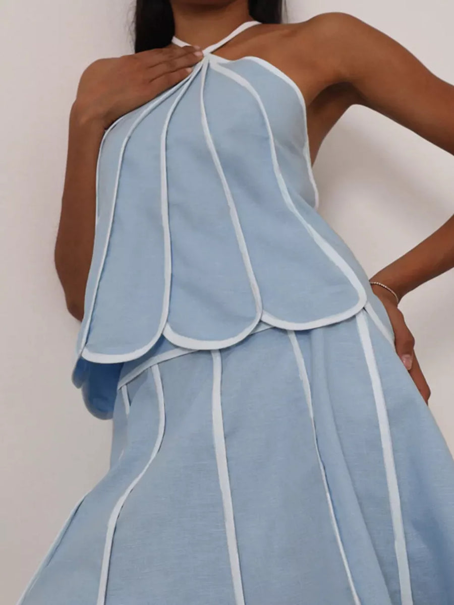 Light blue halter top and skirt set with white piping and scalloped hem detail.
