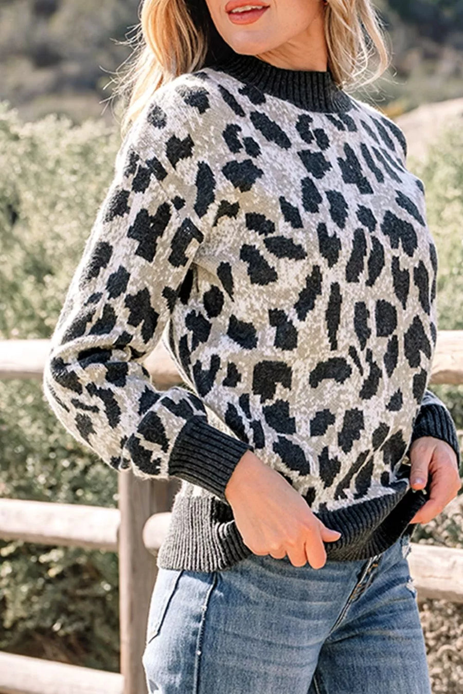 Black pullover sweater with hip-length and pullover