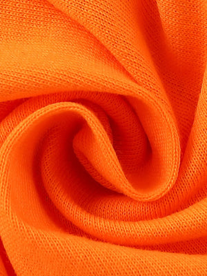 Orange knit fabric with a soft texture and visible weave.