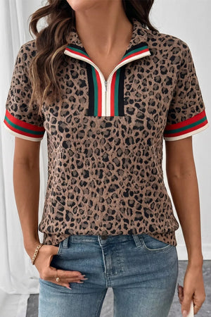Leopard jacquard half-zip shirt with striped collar and sleeve cuffs.