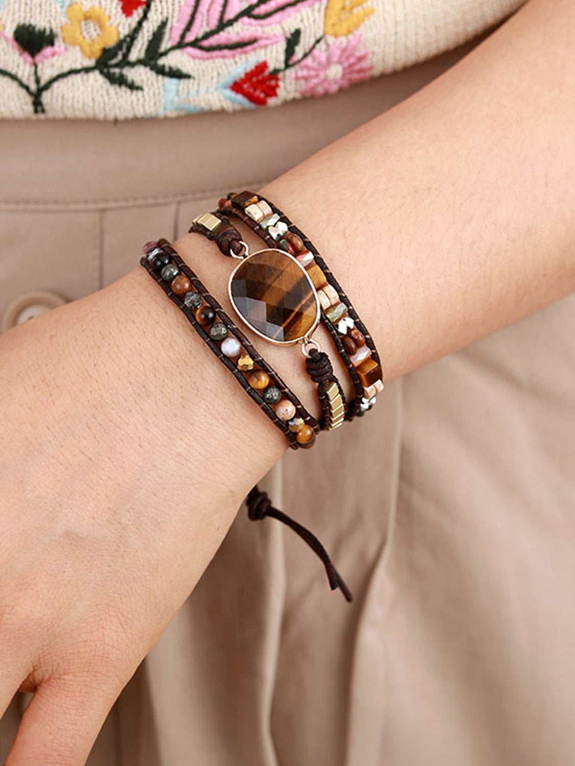 Wrap-around bracelet with tiger's eye stone and mixed beads on leather cord.
