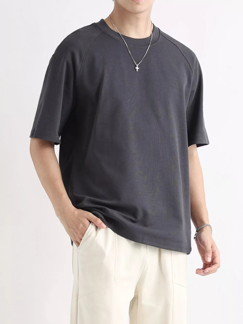 Men's dark gray cotton t-shirt with relaxed fit and crew neck.