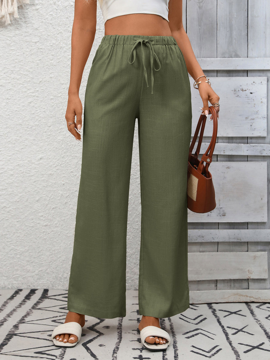 Army green high-waist wide-leg pants with drawstring detail and elastic waistband.