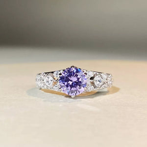 ring in lavender featuring faceted stones and straight fit