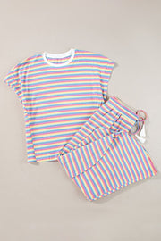 Rainbow stripe cotton culotte jumpsuit with drawstring waist and tassels.