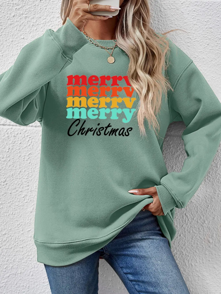 Sage green crewneck sweatshirt with retro "Merry Christmas" graphic