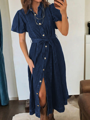 Button-down midi denim dress with puff sleeves, belt, and gold buttons.