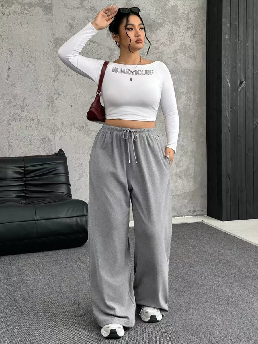 Light gray drawstring wide-leg maternity pants with pockets.